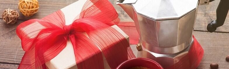 7 Best Coffee Gifts For Her 2025 1 Cup of coffee, gift with red ribbon