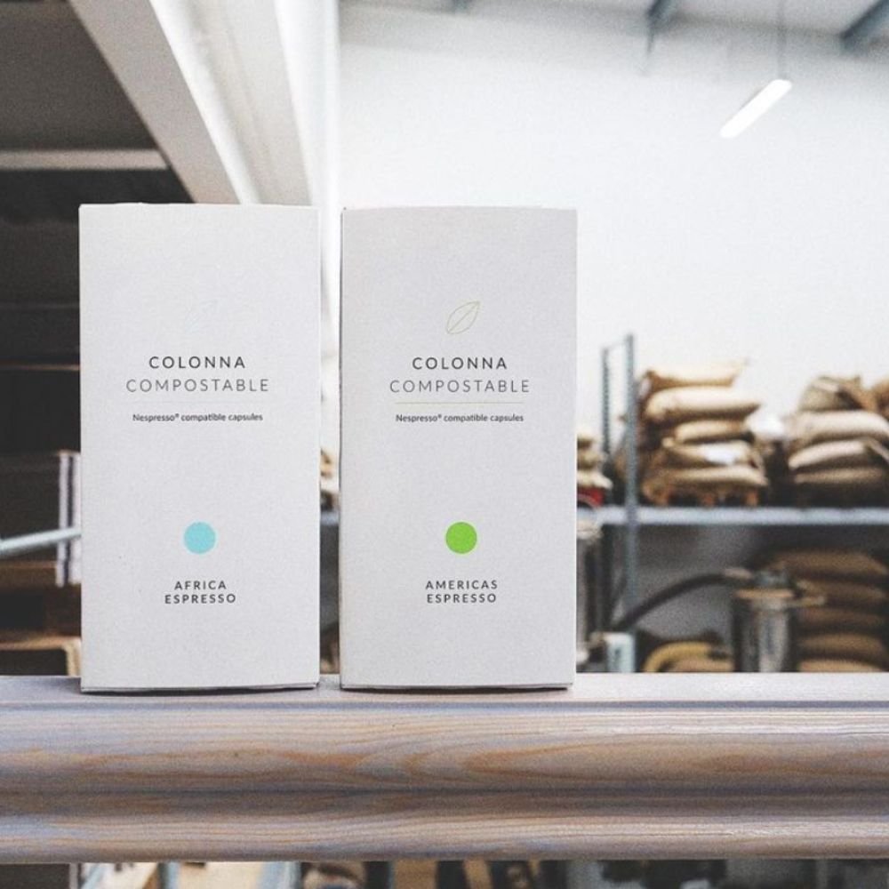 The Best Coffee Pod Subscriptions UK 2026 (Top 8) 10 Two boxes of Colonna compostable espresso capsules in a roastery