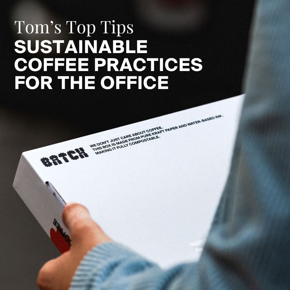 TomHoldingaSustainableCoffeefortheoffice Sustainable Coffee Practices for the Office