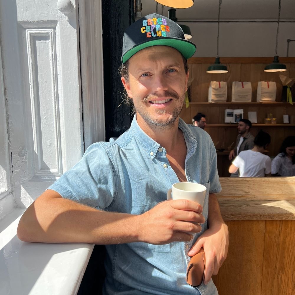 Tom Drinking Batch Brew Coffee